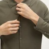 La chemise en tricot en coton biologique