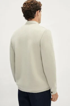 La veste en tricot en laine mérinos