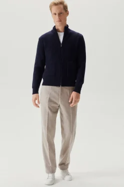 Le cardigan zippé en laine mérinos