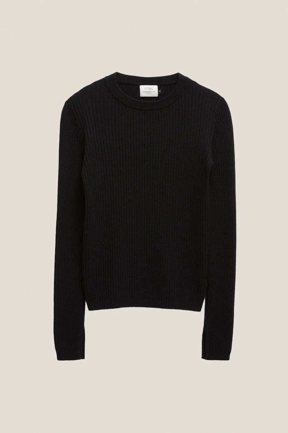 Le pull côtelé en laine mérinos
