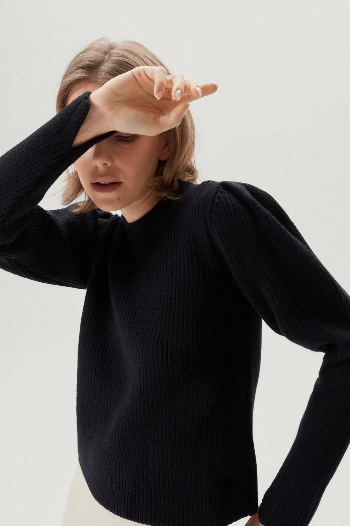 Le pull en laine mérinos avec des pinces